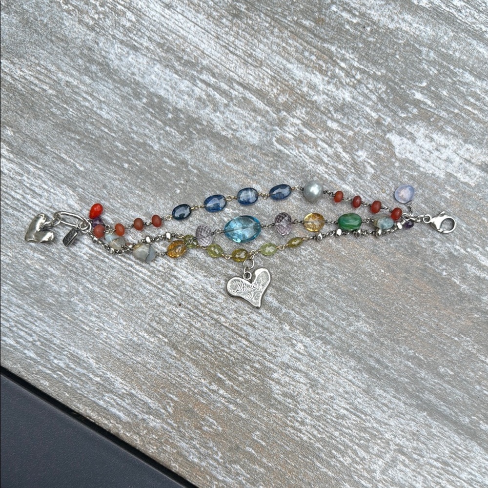 Blue and Red Beaded Bracelet with Playful Design